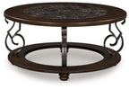 Frallyn - Round Cocktail Table - Dark Brown