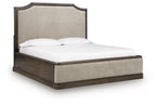 Wickenger - King Upholstered Panel Bed - Dark Brown