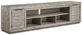 Naydell - XL TV Stand w/Fireplace Option - Gray
