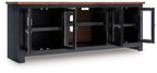 Wildenauer - XL TV Stand With Fireplace Option - Brown / Black